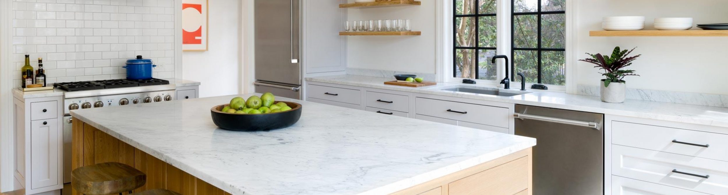 White kitchen with a granite counter top